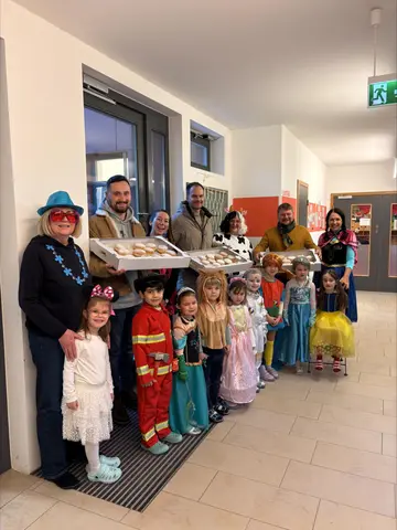 Krapfen  von der CSU für die Kinder im  Regenbogenland