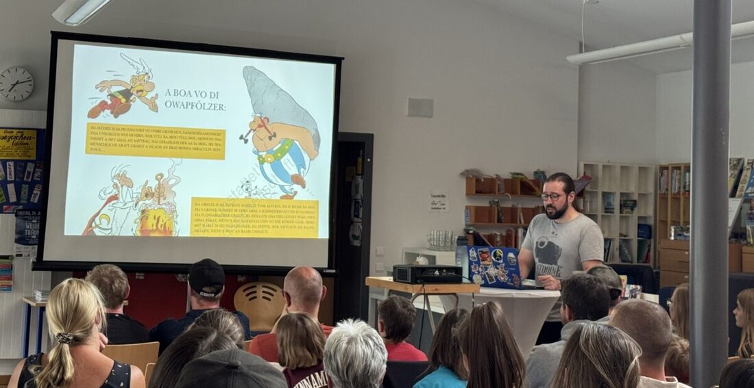 Mantel. In der Marktbibliothek stellte Christian Witt seine oberpfälzische Asterix-Übersetzung vor und ließ Majestix, Asterix und Obelix lebendig werden. Dialektwitz, Römerkrawall und Signierstunde begeisterten das Publikum.