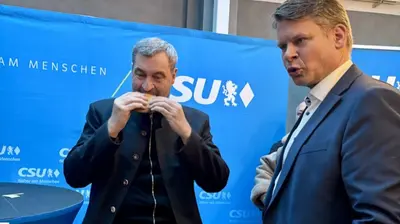 "Auf a Leberkässemmel" mit Markus Söder: Blitzauftritt für CSU-Kandidat Benjamin Zeitler